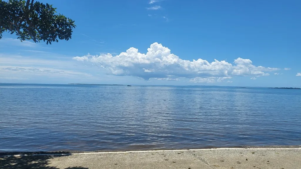 Calm blue water and sky along the Queensland coast.